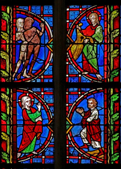 Window w30 depicting Adam and Eve given clothes by French School