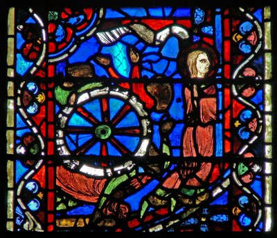Window depicting a scene from the life of St Catherine: the torturers prepare the wheel for her ordeal by French School