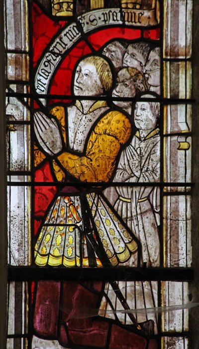 Window w6 depicting a donor and family by French School