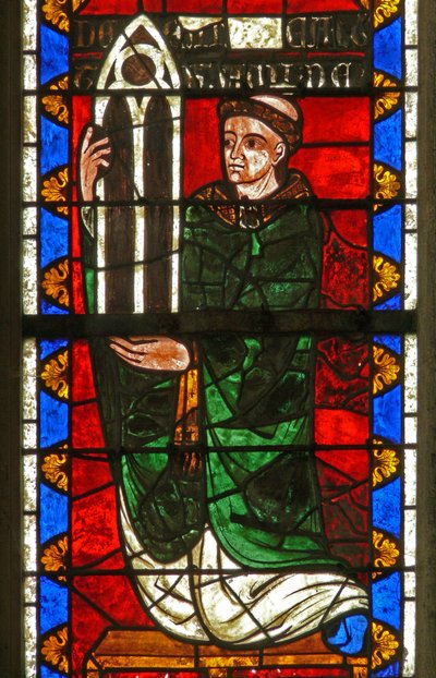 Window w7 depicting donors - the doyen of Argentan giving a window by French School