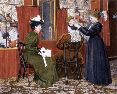 Woman styling a lady with a hat at the Maison Nouvelle by French School