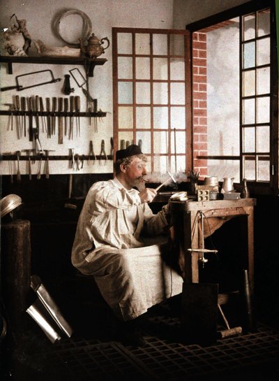 Orfevre in his studio, autochrome by Georges Henry, v. 1910 by George F. Henry