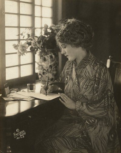 Mary Pickford, Wearing a Kimono, Writing at a Desk, c.1918 by Bartolome Esteban and studio Murillo