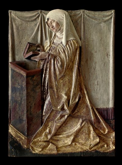 Kneeling donor Fragment of a carved altarpiece in polychrome wood. From Swabia. 1520 approx. Paris, Louvre Museum by German School