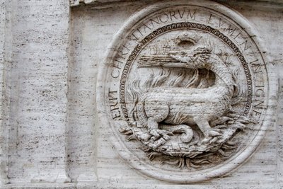 Coat of arms on facade of St Louis of French church by Giacomo della Porta