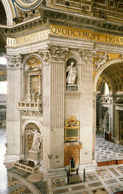 Decorations on first pillar on right, one of four pillars supporting dome of St Peter