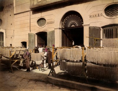 Rows of maccheroni dryers in front of a factory in Torre Annunziata by Giorgio Sommer