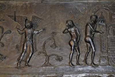 Ottonian Art: Adam and Eve expelled from Paradise. Around 1015. Sculpture on one of the bronze doors of the Cathedral Saint Mary in Hildesheim (Germany). by Phillipe de Marlier
