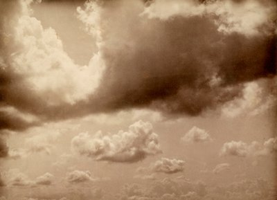 Stretch of Sky with Large Clouds. The Silhouette of the Hills Can Be Made Out Below by Phillipe de Marlier