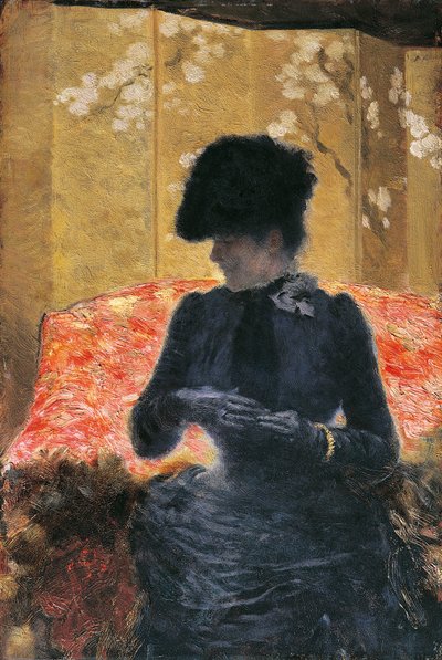 Woman on red sofa by Giuseppe or Joseph de Nittis