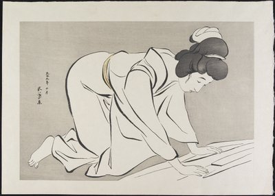 Woman Folding Kimono by Goyo Hashiguchi