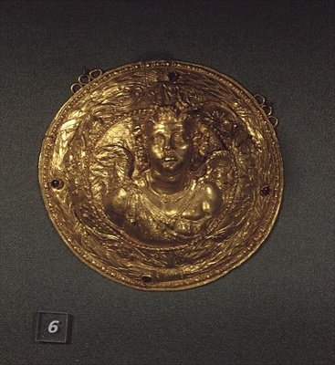 Bust of Eros, medallion decorated with garnets by Greek