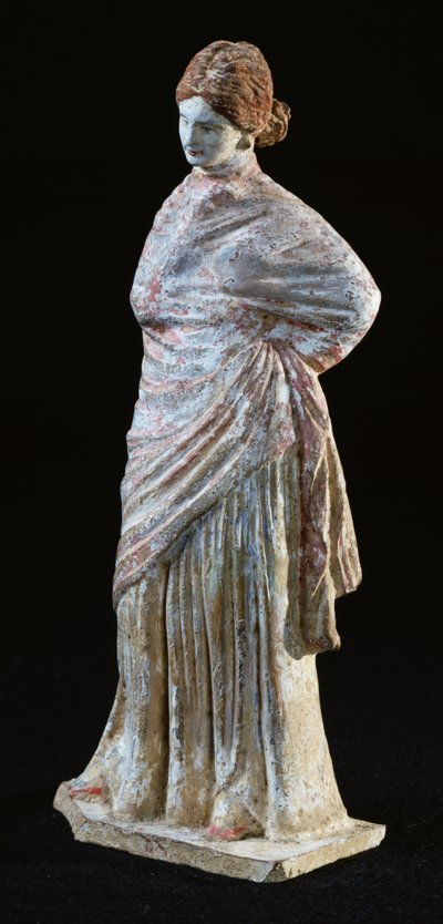 Statuette of a woman with draped clothing, from Tanagra, Boeotia by Greek