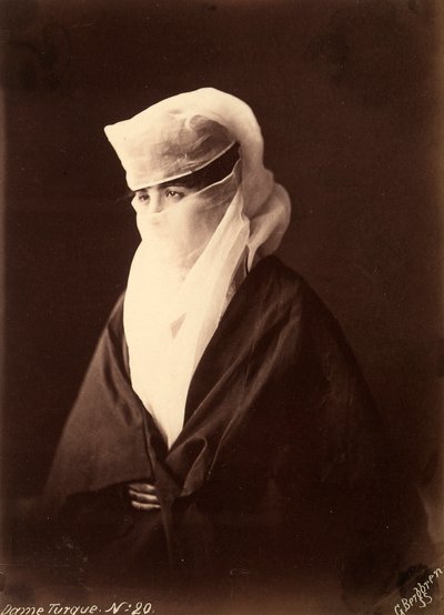 Turkish woman with her face covered by a chador by Guillaume Berggren