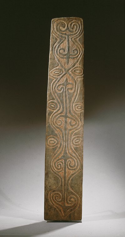 Rectangular New Guinea shield, decorated with carved scrolls in relief, the back with six carved lugs to hold rattan loops, April River by Guinean New