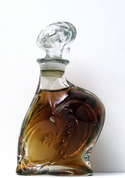 White molded glass bottle created for the Exposition Universelle de Paris in 1900 by Hector Guimard. International Perfumery Museum of Grasse. by Hector Guimard