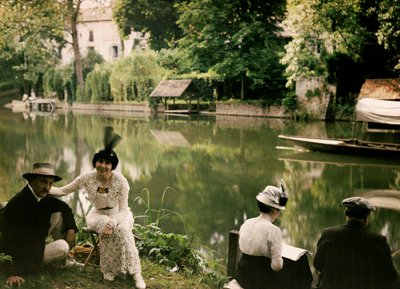 Meal on the Banks of the River at Montigny, France by Henri Chouanard