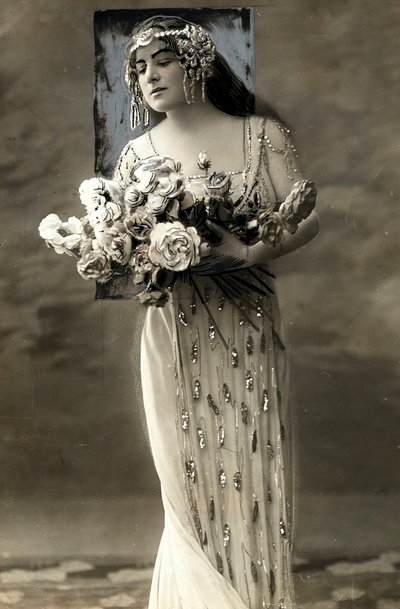 Full-length portrait of Lucy Arbell, French opera singer, in costume by Henri Manuel