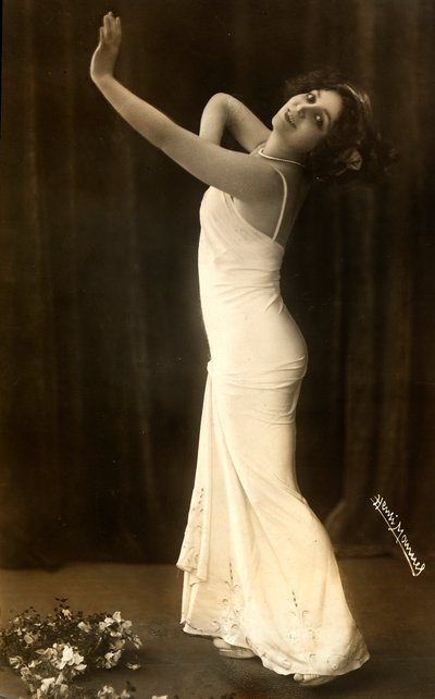 Portrait of the French Actress Regina Badet in an Evocative Pose, Wearing a Long White Dress by Henri Manuel