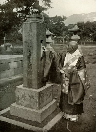 A Buddhist Priest and Praying-Wheel by Herbert Ponting