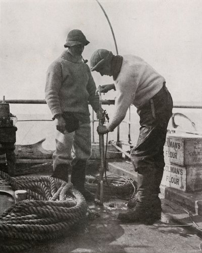 Dr. Wilson and Dr. Atkinson Loading The Harpoon Gun by Herbert Ponting