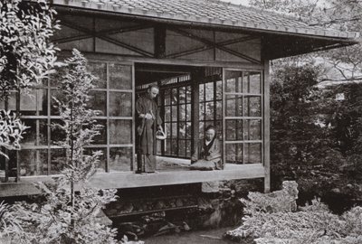 Namikawa San feeding His Carp by Herbert Ponting