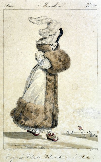 Elegant woman wearing a coat and a velvet hat with feathers. Women
