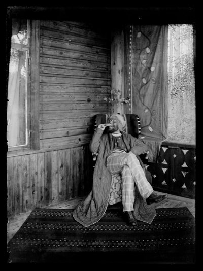 Hugo Simberg in Costume on the Porch of the Andersin Villa by Hugo Simberg