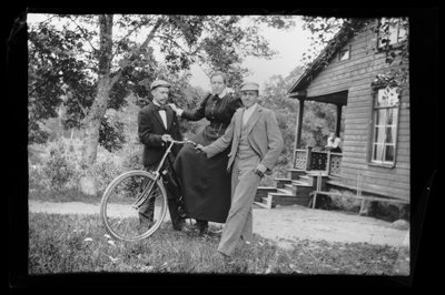 Wolter, Blenda and Einar Simberg in the Yard of the Yellow Villa, Elma Simberg on the Porch by Hugo Simberg