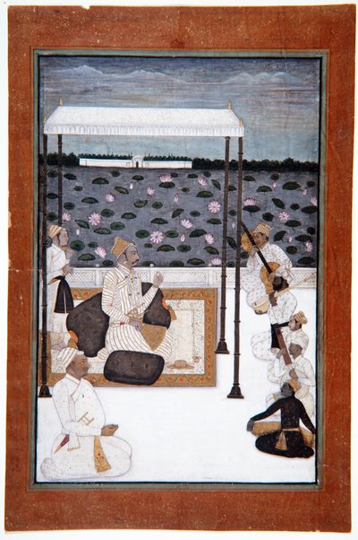 A nobleman listens to music under a canopy on a terrace by a lake by Indian School