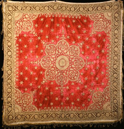 A Scarlet Velvet Floor Cover with Green Velvet Border, Densely Embroidered in Gilt Couched Gilt Thread by Indian School