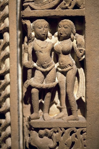 Couple of lovers. Door frame in carved stone, art of Rajasthan or Uttar Pradesh, 9th-10th century. National Museum of Korea, Seoul by Indian School