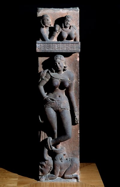 Hinduism: representation of a Yakshini spirit of nature, with a parrot, she stands on a dwarf. Sculpture by Mathura, sandstone. 2nd century. Calcutta, Indian museum by Indian School