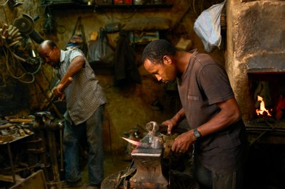 A blacksmith in the marketplace of Erfoud, Morocco (photo) by Ira Block