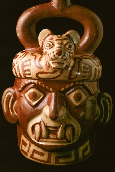 A fanged mouth ceramic artifact found at El Brujo by Ira Block