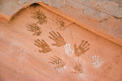 Anasazi handprint, ancient rock art found in Grand Gulch, Utah. by Ira Block