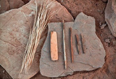 Anasazi tools on a rock in Grand Gulch, Utah by Ira Block