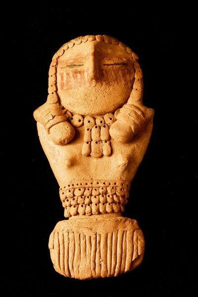 At the College of Eastern Utah Prehistoric Museum in Price, Utah the Fremont era Pilling Figurines, found near Range Creek by Clarence Pilling in 1950. by Ira Block