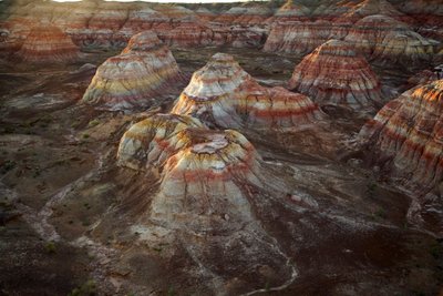 Colored rocks near Wu Cai Wan in the Gobi desert, Xinjiang, Western China by Ira Block