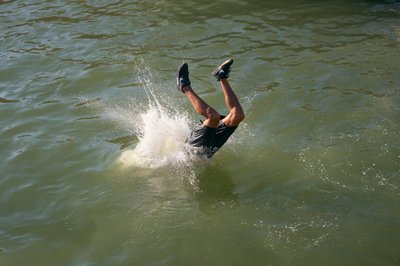 Man diving in the port of Essaouira, Morocco (photo) by Ira Block