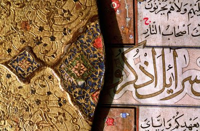 Detail of the Intricate Gold and Lapis Lazuli Illuminations and Arabesque Designs with Thulth and Naskh Scripts on a Koran Cover by Islamic School