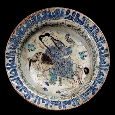 Islamic art: falconer rider dish in ceramic. The beginning of the 13th century. From Iran by Islamic School