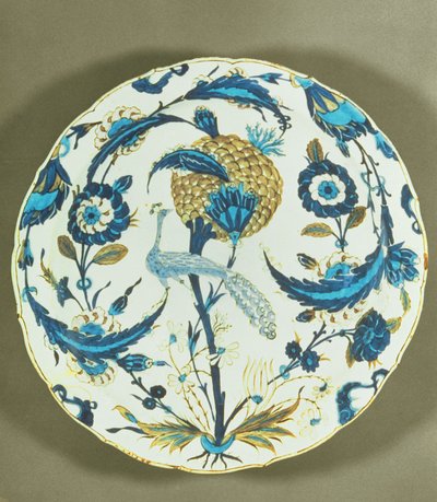 Iznik dish painted with a peacock perched among flowers, Turkey, c.1550-55 by Islamic School