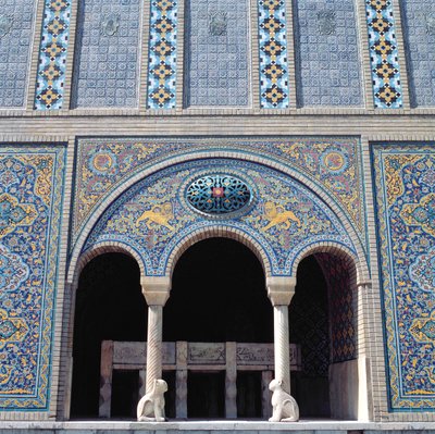 One of the aivans with tiled revetments, grille and monolithic stone columns by Islamic School