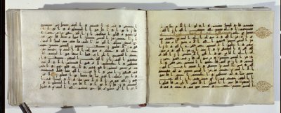Two pages of a Koran manuscript written in Oriental Kufic script by Islamic School