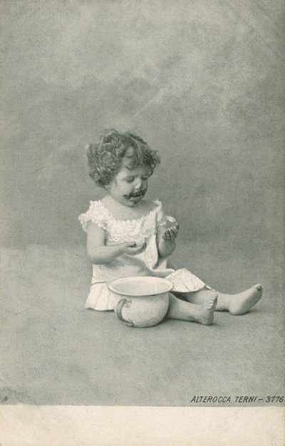 Baby playing with bubbles by Italian Photographer