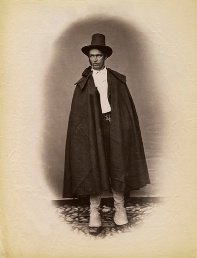 Young Man Wearing Cloak and Hat, Parre, Lombardy, Italy by Italian Photographer