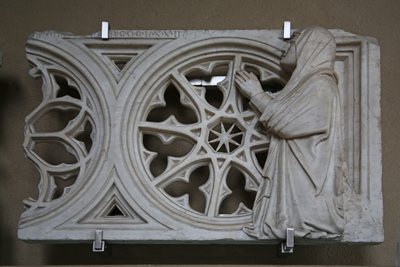 Carved rose wheel transenna with the donor