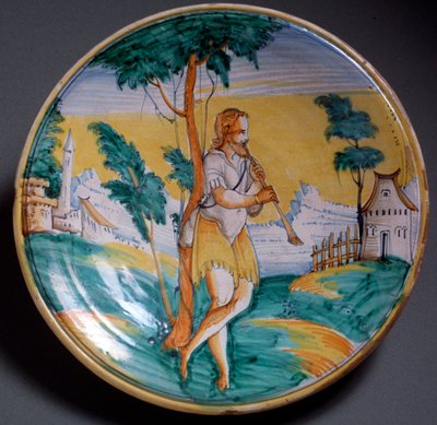 Plate decorated with a flute player, end of 16th century, Viterbo, Italy by Italian School