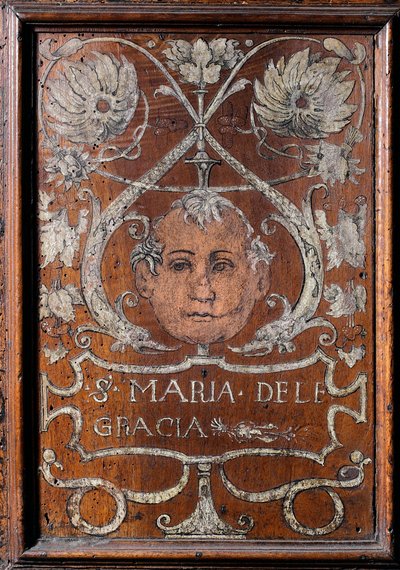 Wooden Plate Decorated with a Face and the Inscription 
